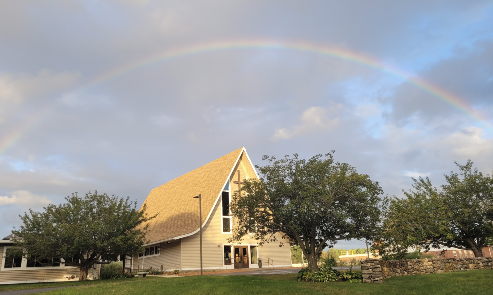 Aldersgate United Methodist Church under a rainbow